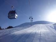 Réjouissance à la perspective de skier sur la piste FIS parfaitement damée de Lenk