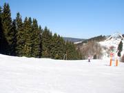 Courte, large et généralement peu fréquentée : piste au téléski d’Astenstraßenlift