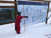 Personnel au plan des pistes en cas de questions