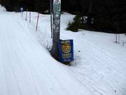 Poubelle à un pylône de remontée