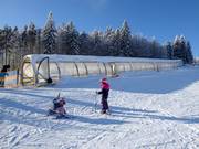 Aire d'entraînement Junior Ski Zirkus avec tapis roulants couverts
