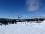 Piste et télésiège directement au village de vacances Idre Fjäll