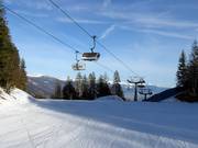 Santel-Meriz - 4 places | Télésiège rapide (débrayable) avec capots de protection