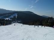 Remontées mécaniques et descente depuis le sommet