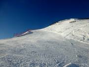 Piste noire Grubengrat qui passe sous la télécabine Grubenkopfbahn
